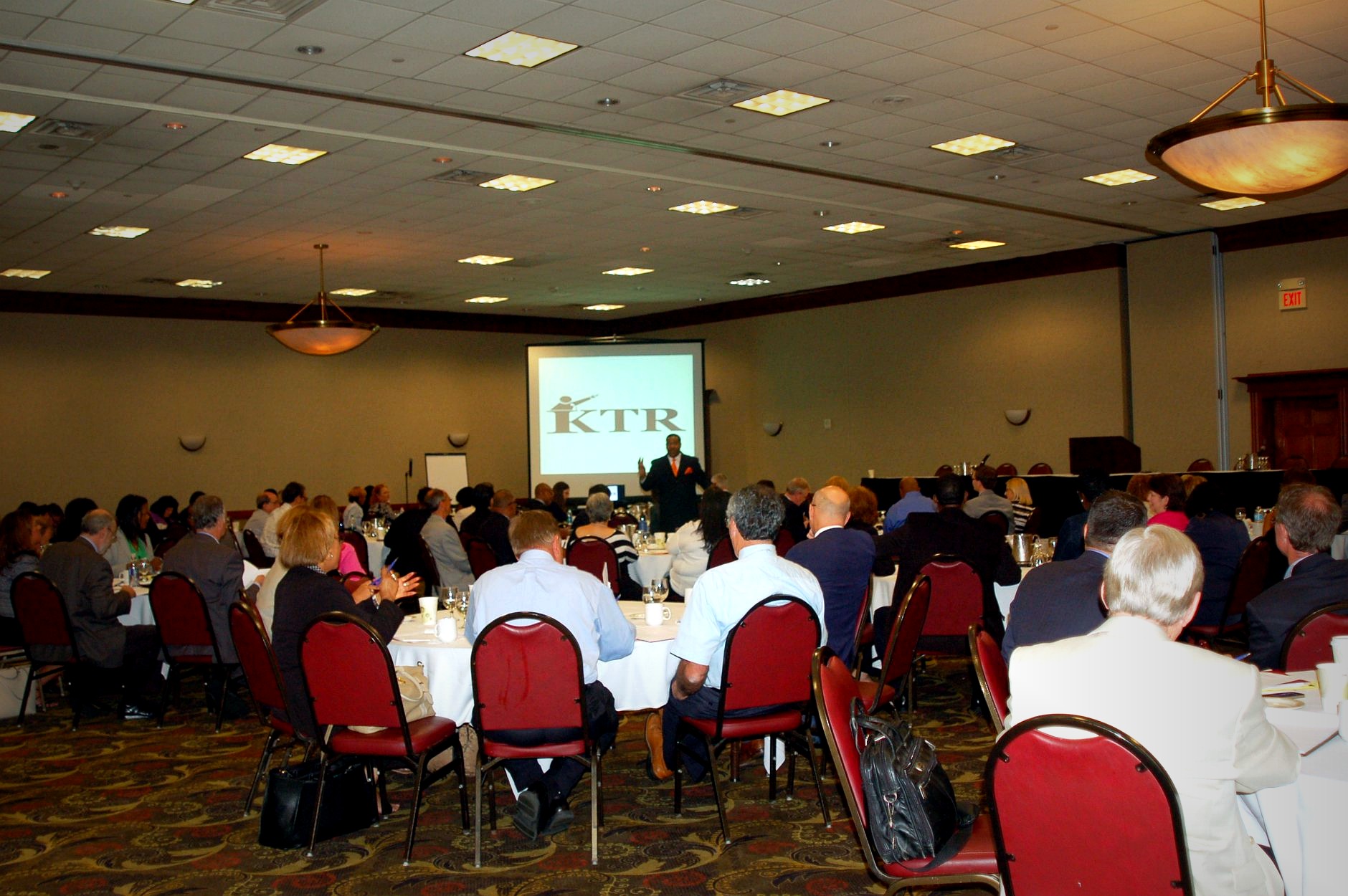 Kevin T. Robertson - KTR presenting leadership strategies to a corporate ballroom audience
