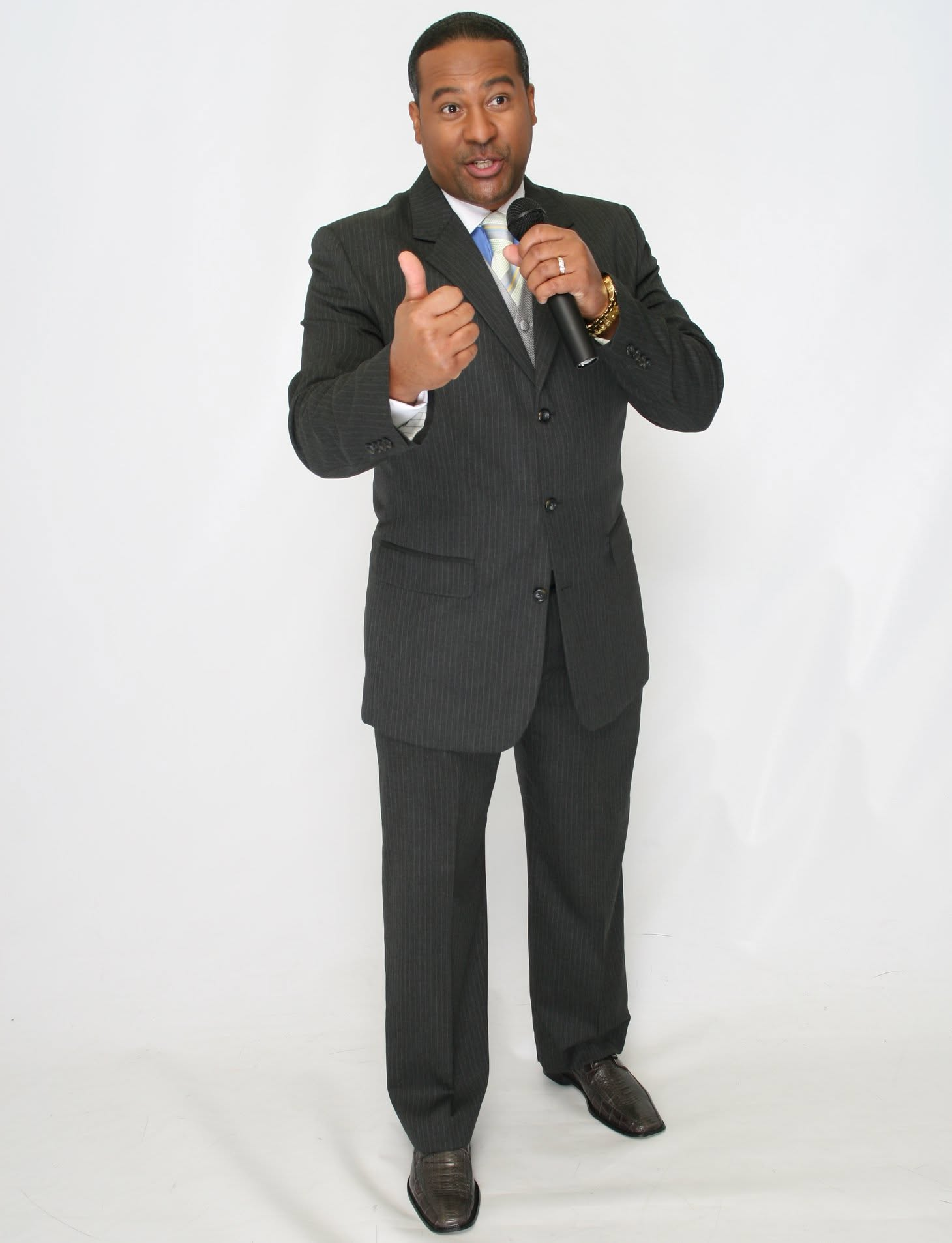 Kevin T. Robertson speaking with microphone