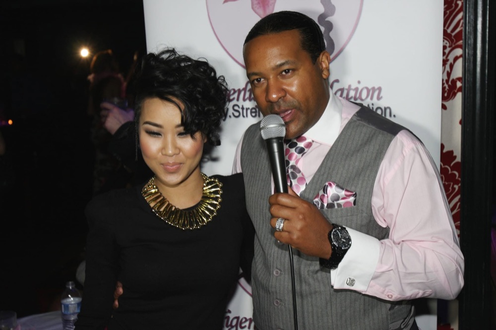 Kevin T. Robertson speaking with a guest at an event
