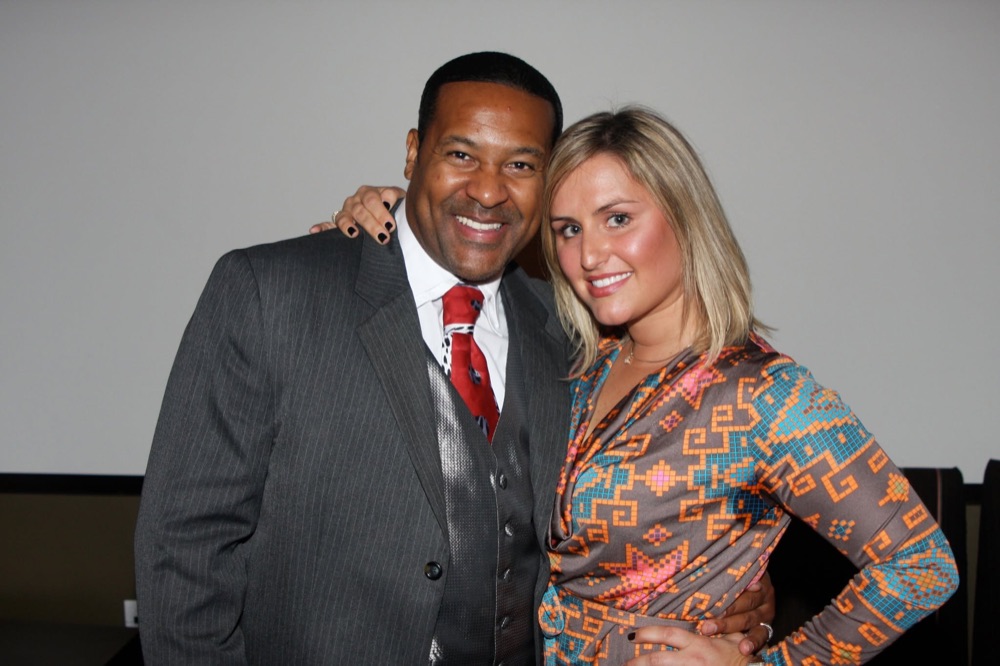 Kevin T. Robertson with an event attendee after a program