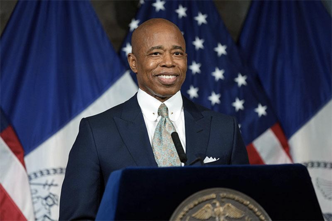 Eric Adams at a New York City podium