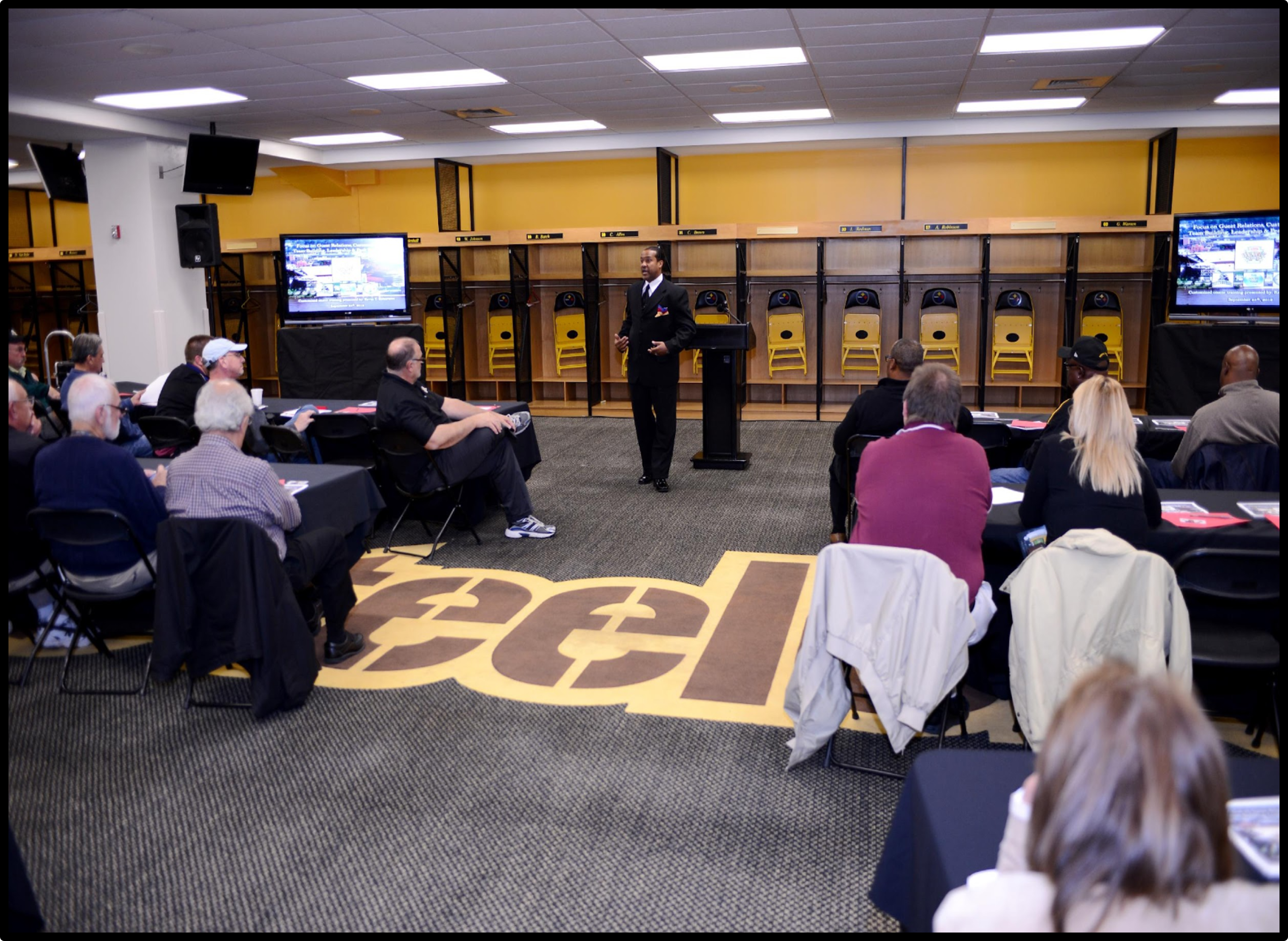 Kevin T. Robertson speaking to game day staff at Heinz Field